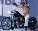 Qui est le catcheur de la ECW qui vient en moto sur scne ?