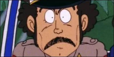 Qui est le policier en charge du village Pingouin dans "Dr Slump" ?