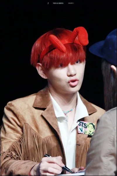 Dans quel clip a-t-il les cheveux rouges ?