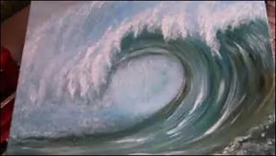 Comment appelle-t-on une vague déferlante dont la crête est enroulée ?