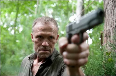 Qui a perdu la clé des menottes de Merle Dixon ?