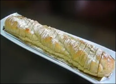Quel est ce pain sur lequel on rajoute souvent du beurre et de l'ail ?