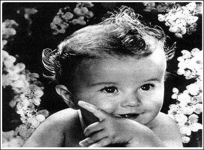 Quel était le partenaire de ce bel enfant, selon une pub Guigoz, pour qu'il fût en pleine santé ?