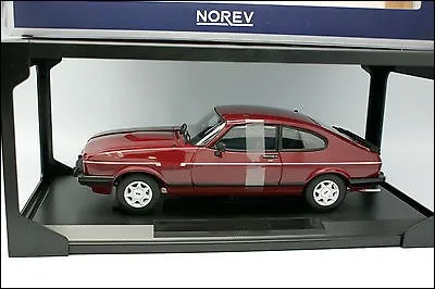 Voiture bien conservée, dans sa boîte transparente !