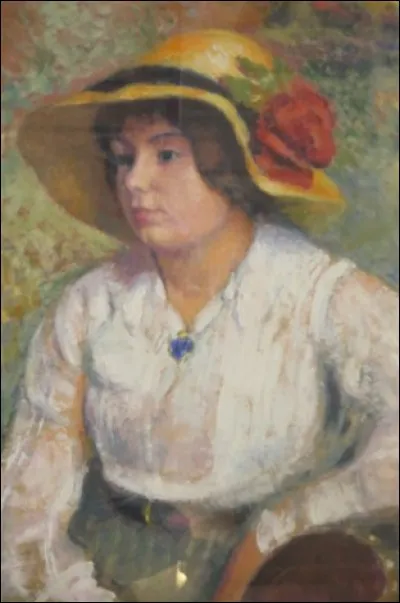 Qui a représenté ce "portrait de femme au chapeau fleuri" ?
