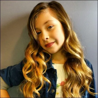 Avec qui Gloria a-t-elle fait une photo au W9 d'or ?