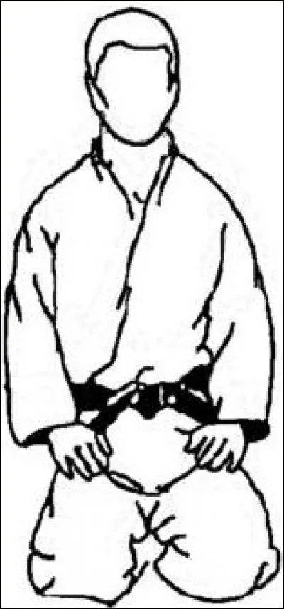 Quel genou doit-on poser en premier à terre lors du salut "assis" ?