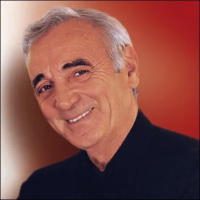 Dans la chanson "Comme ils disent" de Charles Aznavour, dans quelle rue de Paris habite "l'artiste" ?