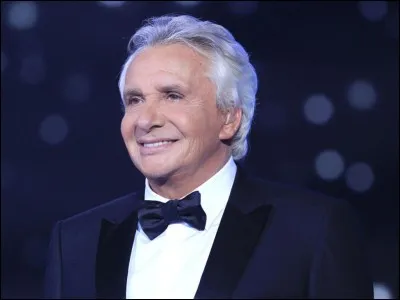 « Je suis arrivé un beau matin du mois de mai avec à la main les beignets qu'ma mère m'avait faits « sont les paroles d'une chanson de Michel Sardou. Laquelle ?