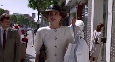 De quelle couleur est la perruque de Viviane au début ?