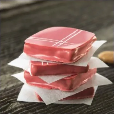 À quelle ville associe-t-on ces confiseries délicates faites de l'association de pâte d'amande à l'orange et de praliné aux amandes et noisettes ?