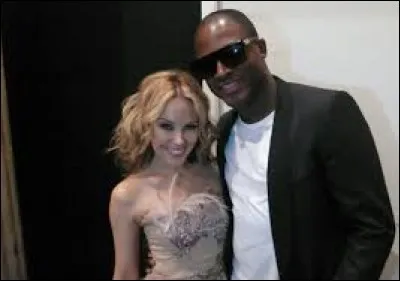 En 2010, avec quelle chanteuse Taio Cruz partage-t-il un duo sur la chanson "Higher" ?