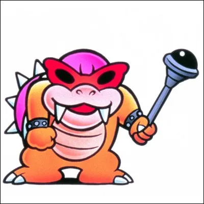 (Complétez la phrase) Les 3 attaques de Roy sont : son sceptre, des tremblements de terre et un canon à [...].