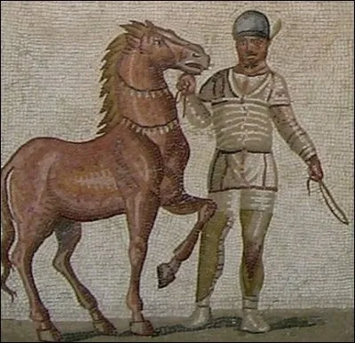 Que voyons-nous autour du cou de ce fier cheval de cirque immortalisé par cette mosaïque de l'Antiquité romaine ?