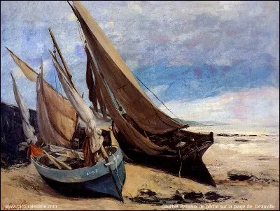 Bateaux de pêche sur la plage de Deauville est un tableau de ...