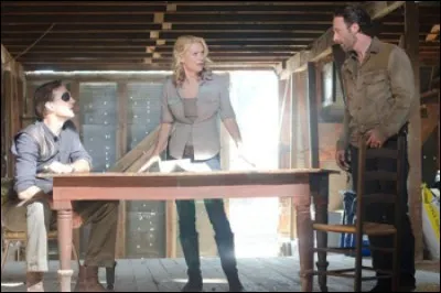 Saison 3, épisode 13 : Alors que Rick à rendez-vous avec le Gouverneur pour parler, qui Rick a-t-il amené avec lui ?