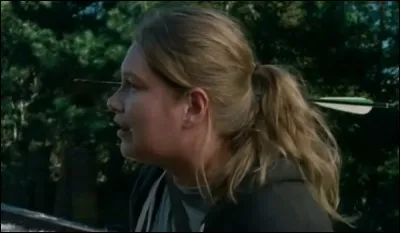 Saison 6, épisode 14 : Denise Cloyd trouve la mort par une flèche dans la tête tirée par Dwight. Dans les comics un personnage connaît exactement la même fin ; qui est-ce ?