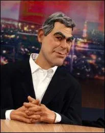 A qui appartient cette marionnette dans les guignols de l'info?