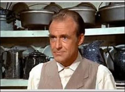 Comment est Monsieur Olson ?