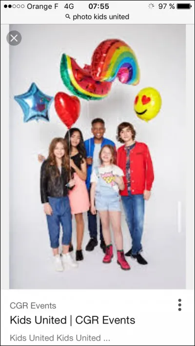 Comment s'appelle le coach vocal des Kids United ?