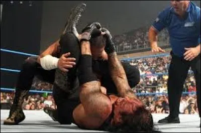 Lequel de ces catcheurs utilisait la prise de soumission "Hell's Gate" ?