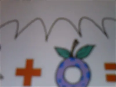 Dans le tome 1, comment s'appellent les "sortes de donuts" que doivent attraper les concurrents (dont Gryf) pour gagner la course ?