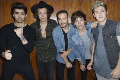 Combien de chansons a-t-il en partie écrites dans l'album "Four" ?