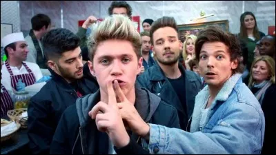 Qui a signé un autographe à un policier dans le clip de "Midnight Memories" ?