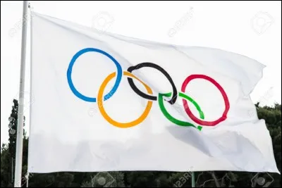 En quelle année le drapeau olympique devint-il le drapeau officiel des Jeux olympiques ?