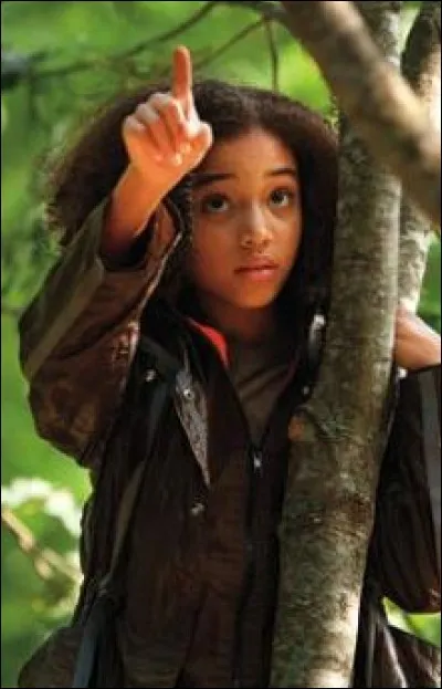 C'est une petite fille mourant dans l'arène alors que l'héroïne et elle étaient amies. Qui est-ce ?