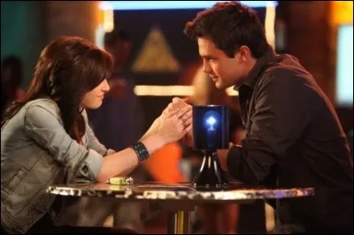 Quel est le score obtenu par Chase au jeu des paniers du Tric, grâce à l'aide de Nathan, pour impressionner Mia ?