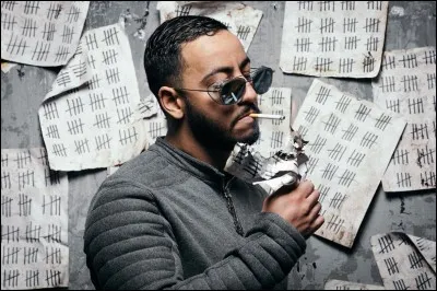 Avec qui Lacrim a-t-il chanté "Oh bah oui" ?