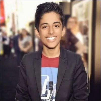 Quel est le prénom du garçon ayant été adopté à 10 ans avec un varan comme animal de compagnie ?