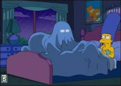 Dessin animé - Sur l'image, vous pouvez voir Marge et Homer Simpson sous la couette.
