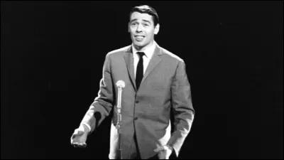 " Ce soir j'attends XXX On prendra le tram trente-trois pour manger des frites chez Eug&egrave;ne XXX c'est mon No&euml;l c'est mon Am&eacute;rique &agrave; moi m&ecirc;me qu'elle est trop bien pour moi..." : qui Brel attend-il ?