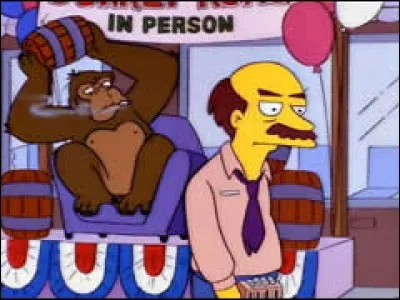 Qui est ce gros singe tenant le tonneau ?
