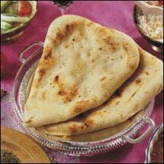 Le naan est un pain consomm en inde et en Asie. Il est cuit dans un four en terre cuite. Outre la farine, l'eau et le sel, il peut y avoir :
