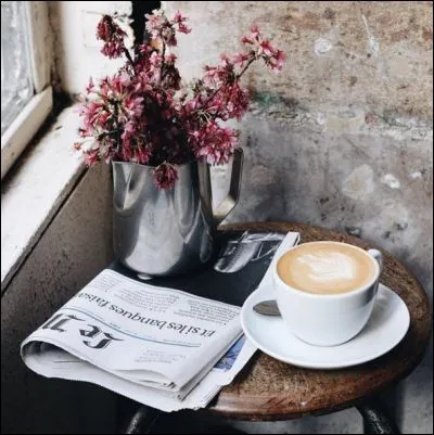 Selon les paroles de Laurent Voulzy dans sa chanson "Belle île en mer" : comment était le café... au lait mélangé" ?