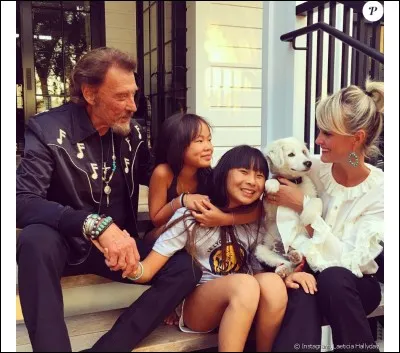 Comment se nomment les enfants que Johnny a adoptés avec sa femme Laetitia ?