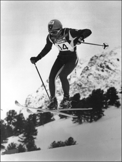 Précurseur et visionnaire, il a fait évoluer le ski avec son sens de la trajectoire et ses départs canons en basculant sur ses pôles.

À partir des Jeux de Grenoble, il a changé l'histoire de son sport en devenant seulement le second à remporter les 3 épreuves de ski lors de la même Olympique !
Président de l'organisation des J.O. d'Albertville.