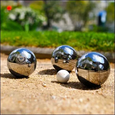 Au jeu de boules, jeter sa boule en l'air de manière à ce qu'elle reste où elle tombe.