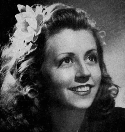 Née le 31 décembre 1917, cet actrice et chanteuse a notamment joué dans "L'assassin habite au 21" et dans "Quai des Orfèvres". Qui est-ce ?