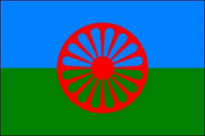 À quelle communauté appartient ce drapeau orné d'une roue rouge ?