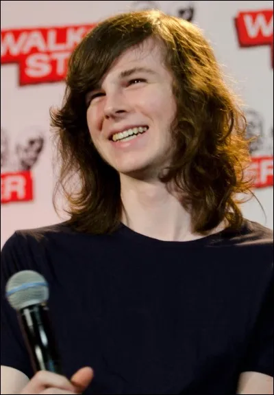 Comment s'appelle l'acteur qui joue Carl Grimes ?