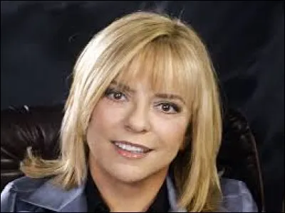 Avec qui chante-t-elle en duo "Ça balance pas mal à Paris" en 1976 ?