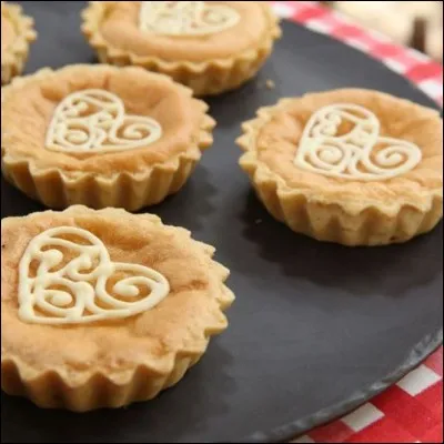 Quel ingrédient parfume le gâteau nommé "Tourment d'amour" ?