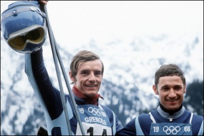 Aux Jeux olympiques d'hiver de 1968 à Grenoble, Jean-Claude Killy justifie son statut de favori en remportant les 3 médailles d'or. En descente, les skieurs français réalisent un doublé. Qui prend la deuxième place, à 8 centièmes seulement de Killy ?