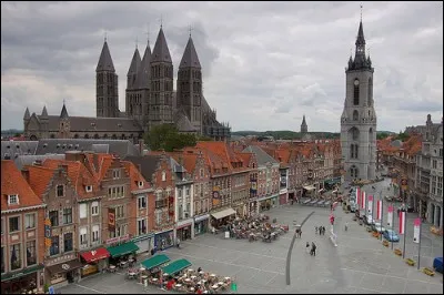 Où pourrez-vous voir cette grande cathédrale à cinq tours ?Quelle est cette ville, l'une des plus anciennes de Belgique ?