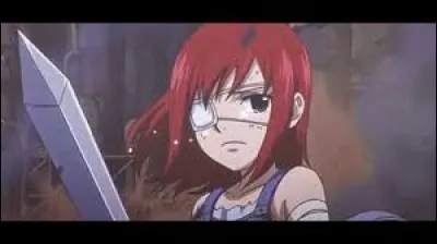 Comment s'appelle la personne qu'Erza a sauv&eacute;e quand elle &eacute;tait petite ?