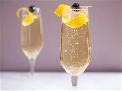 1 cl de sirop de sucre de canne, 3 cl de gin, 2 cl de jus de citron, le tout dans une coupe ou une flûte de champagne !